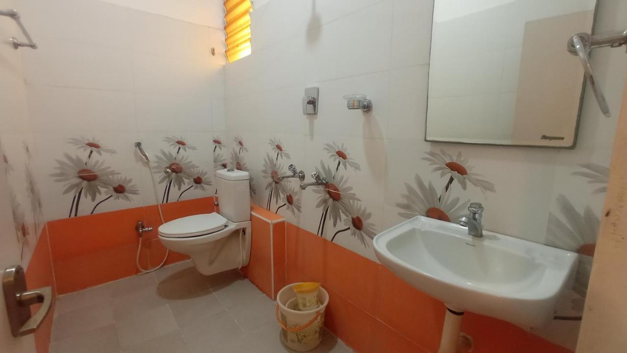 Amaran Hotels Madurai Værelse billede