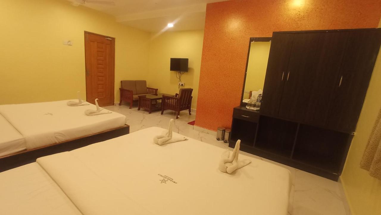 Amaran Hotels Madurai Værelse billede